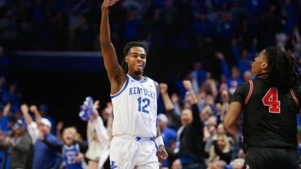 Kentucky s Antonio Reeves celebrates making a three against Georgia s Silas Demary Jr Saturday night at Rupp Arena. Jan. 20, 2024