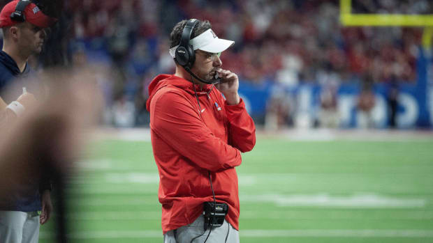 Arizona football coach Jedd Fisch looks on during a game.