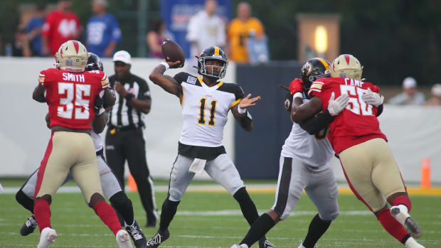 Pittsburgh Maulers Troy Williams (11) prepares to throw downfield during the first half of the USFL Championship game against the Birmingham Stallions Saturday evening at Tom Benson Stadium in Canton, OH.  