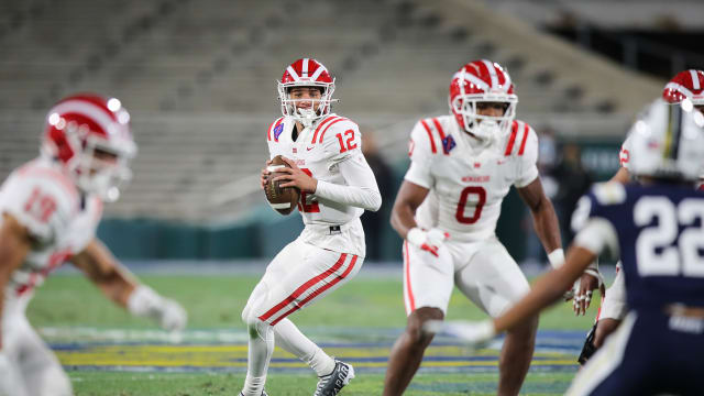 PASADENA, CALIFORNIA - NOVEMBER 25: Quarterback Elijah Brown #12 of the Mater Dei Monarchs looks to pass the ball against the St. John Bosco Braves during the 2022 CIF-SS-Ford Division 1 Football Championship at Rose Bowl Stadium on November 25, 2022 in Pasadena, California.