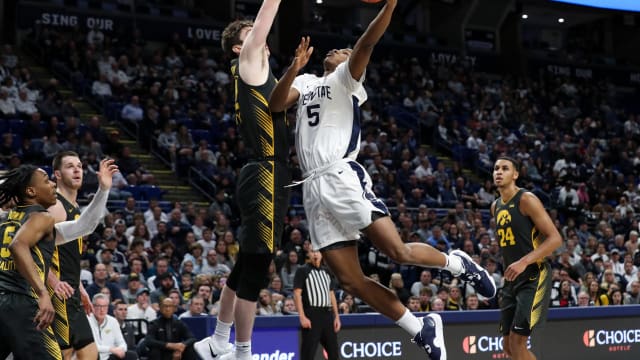 Penn State guard Jameel Brown drives to the basket against Iowa in a Big Ten Conference basketball game.