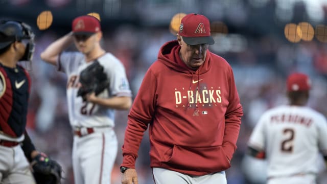 Zach Davies following a mound visit from Brent Strom