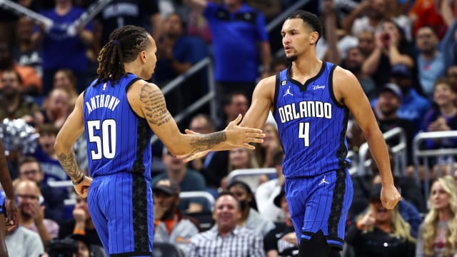 Jan 20, 2023; Orlando, Florida, USA; Orlando Magic guard Jalen Suggs (4) is congratulated by guard Cole Anthony (50) against the New Orleans Pelicans during the second half at Amway Center. Mandatory Credit: Kim Klement-USA TODAY Sports