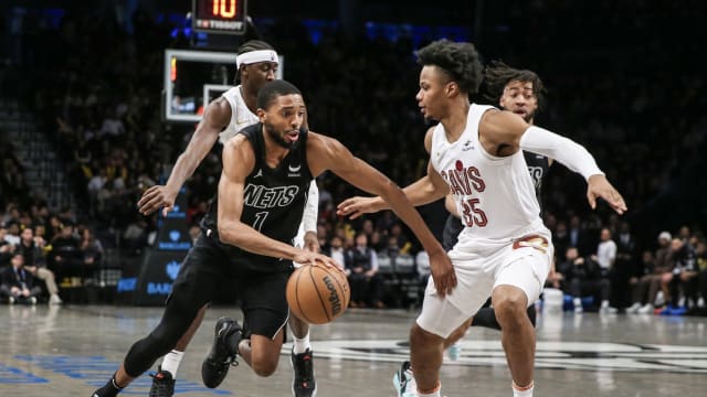 Brooklyn Nets forward Mikal Bridges (1) looks to drive past Cleveland Cavaliers forward Isaac Okoro (35) in the third quarter at Barclays Center.