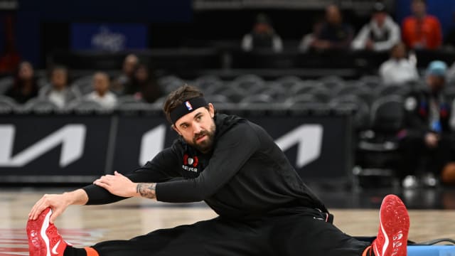 Detroit Pistons forward Joe Harris (31) stretches before a game against the Washington Wizards at Little Caesars Arena.