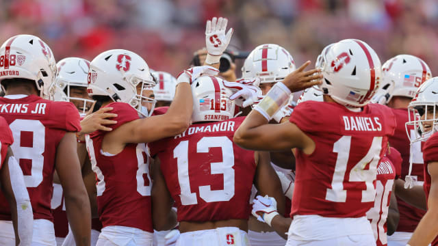 Sep 16, 2023; Stanford, California, USA; Stanford Cardinal wide receiver Elic Ayomanor (13) is congratulated by teammates after catching a touchdown pass during the second quarter against the Sacramento State Hornets at Stanford Stadium. Mandatory Credit: Sergio Estrada-USA TODAY Sports