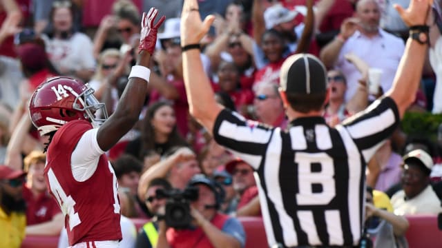 Alabama Crimson Tide wide receiver Jalen Hale (14) celebrates a touchdown catch against Mississippi at Bryant-Denny Stadium. Alabama defeated Mississippi 24-10.