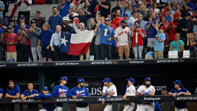 Texas Rangers fans celebrate during the team's Game 3 win over the Baltimore Orioles on Oct. 10 at Globe Life Field. Rangers players hope fans at ALCS Game 3 Wednesday are as loud as Philadelphia Phillies fans have been during postseason games at Citizens Bank Park.