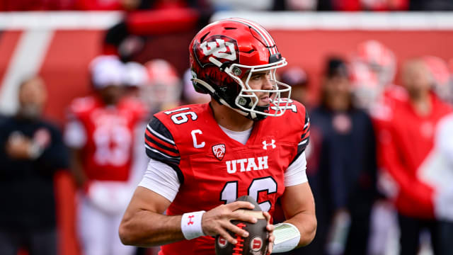 Oct 28, 2023; Salt Lake City, Utah, USA; Utah Utes quarterback Bryson Barnes (16) steps out of the pocket against the Oregon Ducks during the first half at Rice-Eccles Stadium.