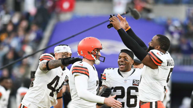 Nov 12, 2023; Baltimore, Maryland, USA; Cleveland Browns linebacker Anthony Walker Jr. (5) places a crown on place kicker Dustin Hopkins (7) head after kicking the game winning field goal against the Baltimore Ravens at M&T Bank Stadium.