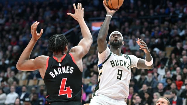 Milwaukee Bucks forward Bobby Portis Jr. (9) shoots the ball over Toronto Raptors forward Scottie Barnes (4) 