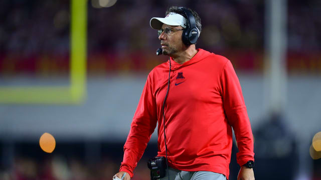 Oct 7, 2023; Los Angeles, California, USA; Arizona Wildcats head coach Jedd Fisch watches game action against the Southern California Trojans during the second half at Los Angeles Memorial Coliseum.