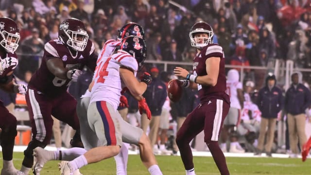 Mississippi State Bulldogs quarterback Will Rogers (2) looks to pass against the Mississippi Rebels during the second quarter at Davis Wade Stadium at Scott Field.