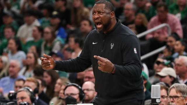 Milwaukee Bucks head coach Adrian Griffin reacts 