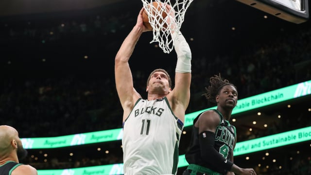 Milwaukee Bucks center Brook Lopez (11) shoots during the second half against the Boston Celtics