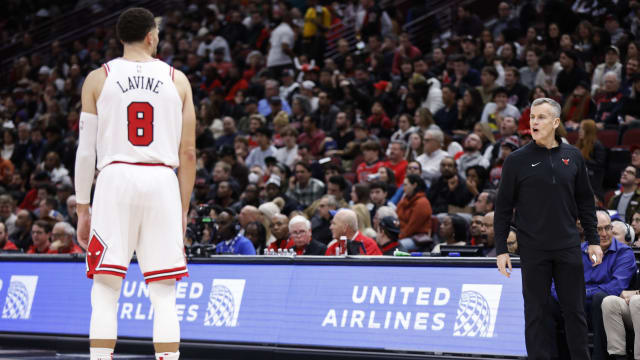 Chicago Bulls head coach talks to guard Zach LaVine (8) during the second half of a basketball game against the Miami Heat at United Center.