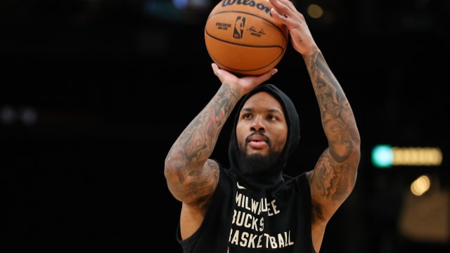 Milwaukee Bucks guard Damian Lillard (0) warms up 