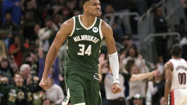 Milwaukee Bucks forward Giannis Antetokounmpo (34) reacts after scoring a 