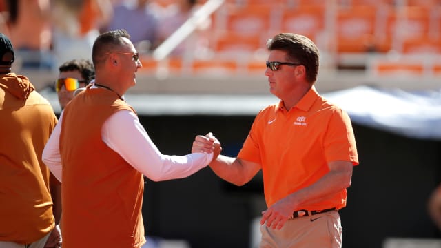 steve sarkisian mike gundy oklahoma state cowboys 44