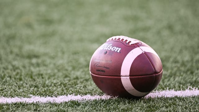 Sep 2, 2022; Montreal, Quebec, CAN; General view of a CFL official football on the field during warm-up at Percival Molson Memorial Stadium. Mandatory Credit: David Kirouac-USA TODAY Sports