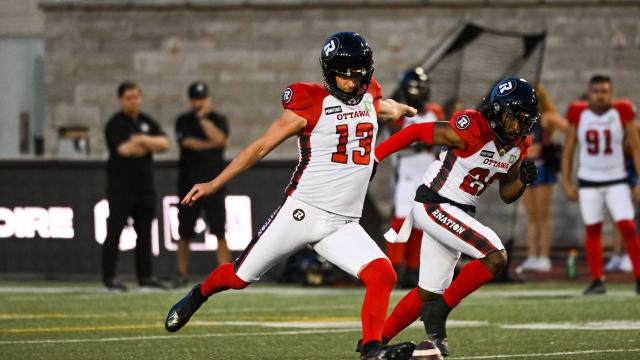 Sep 2, 2022; Montreal, Quebec, CAN; Ottawa Redblacks kicker Richie Leone (13) kickoffs the ball during the second quarter at Percival Molson Memorial Stadium. Mandatory Credit: David Kirouac-USA TODAY Sports  