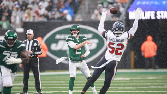 Jets' QB Zach Wilson (2) attempts a pass against Houston