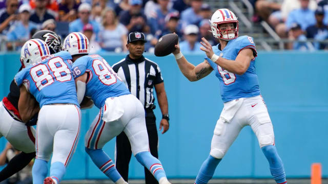 Tennessee Titans quarterback Will Levis (8) reacts after wide receiver DeAndre Hopkins (10) received a pass for a touchdown against the Atlanta Falcons during the first quarter at Nissan Stadium