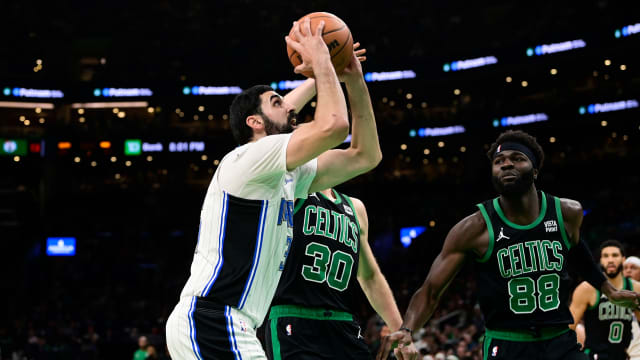 Dec 15, 2023; Boston, Massachusetts, USA; Orlando Magic center Goga Bitadze (35) shoots against the Boston Celtics during the first half at TD Garden.