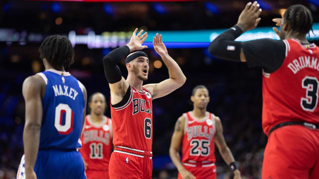 Chicago Bulls guard Alex Caruso (6) reacts with center Andre Drummond (3) after scoring against the Philadelphia 76ers during the third quarter at Wells Fargo Center. 