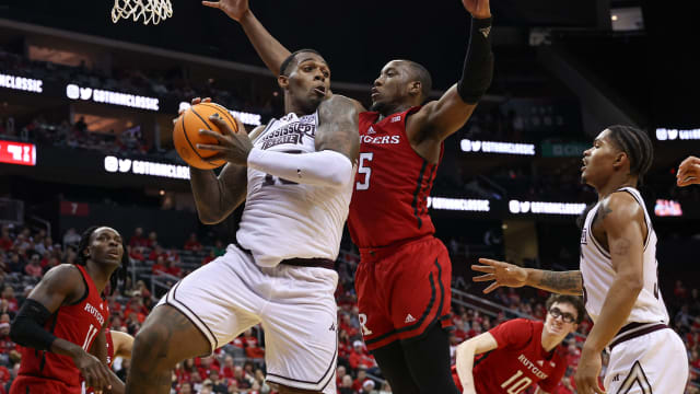 Mississippi State Bulldogs forward Jimmy Bell Jr. (15) rebounds against Rutgers Scarlet Knights forward Aundre Hyatt (5) during the second half at Prudential Center.