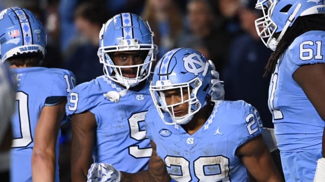 Nov 11, 2023; Chapel Hill, North Carolina, USA; North Carolina Tar Heels running back Omarion Hampton (28) with wide receiver Devontez Walker (9) after scoring a touchdown in the fourth quarter at Kenan Memorial Stadium.