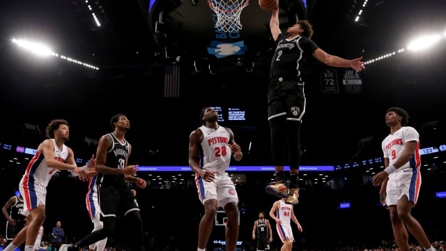  Brooklyn Nets forward Cameron Johnson (2) dunks against Detroit Pistons center Isaiah Stewart (28) and guard Cade Cunningham (2) and forward Ausar Thompson (9) 