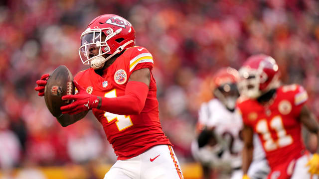 Kansas City Chiefs wide receiver Rashee Rice (4) catches a pass in the first quarter during a Week 17 NFL football game between the Cincinnati Bengals and the Kansas City Chiefs, Sunday, Dec. 31, 2023, at GEHA Field at Arrowhead Stadium in Kansas City, Mo.  