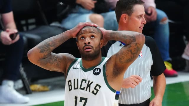 Milwaukee Bucks forward P.J. Tucker (17) reacts 