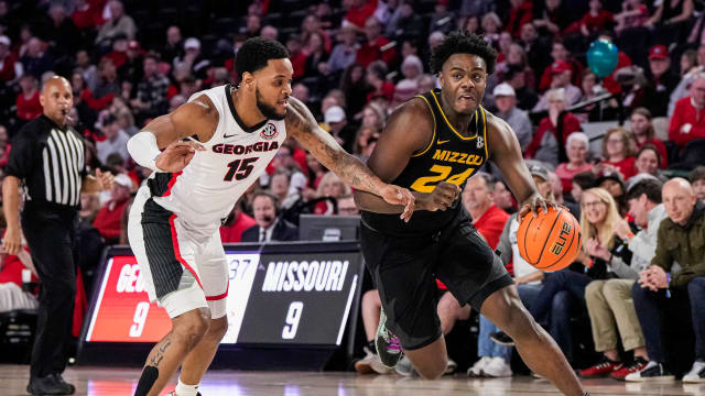 Feb 25, 2023; Athens, Georgia, USA; Missouri Tigers guard Kobe Brown (24) dribbles against Georgia Bulldogs forward Jailyn Ingram (15) during the first half at Stegeman Coliseum. Mandatory Credit: Dale Zanine-USA TODAY Sports