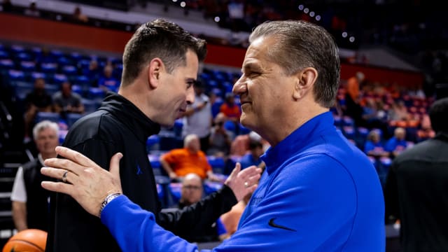 Feb 22, 2023; Gainesville, Florida, USA; Florida Gators head coach Todd Golden (left) and Kentucky Wildcats head coach John Calipari (right )embrace before the game at Exactech Arena at the Stephen C. O'Connell Center. Mandatory Credit: Matt Pendleton-USA TODAY Sports