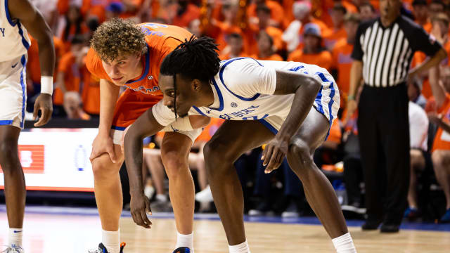 Jan 6, 2024; Gainesville, Florida, USA; Florida Gators center Micah Handlogten (3) and Kentucky Wildcats forward Aaron Bradshaw (2) chat during a free throw during the second half at Exactech Arena at the Stephen C. O'Connell Center. Mandatory Credit: Matt Pendleton-USA TODAY Sports