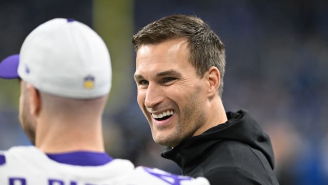 Jan 7, 2024; Detroit, Michigan, USA; Minnesota Vikings quarterback Kirk Cousins (8) smiles with teammates prior to their game against the Detroit Lions at Ford Field.