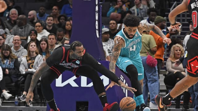 Chicago Bulls center Henri Drell (3) and Charlotte Hornets center Nick Richards (4) go after a loose ball during the second half at the Spectrum Center. 