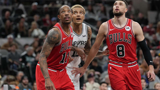 Chicago Bulls forward DeMar DeRozan (11) and guard Zach LaVine (8) block out San Antonio Spurs forward Jeremy Sochan (10) in the second half at Frost Bank Center. 