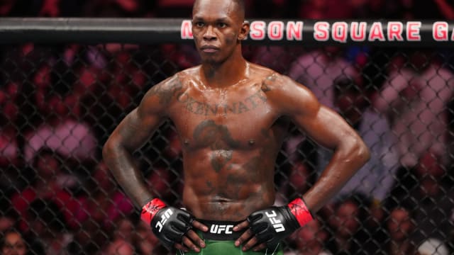 Israel Adesanya stares down his opponent, Alex Pereira, inside Madison Square Garden in New York City during the UFC 281 main event.