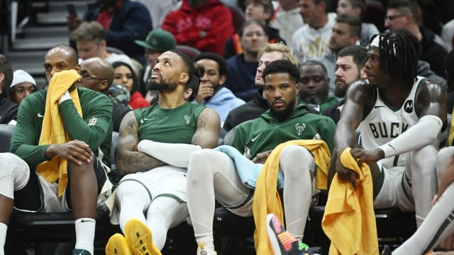 The Milwaukee Bucks bench looks on during the second half against the Cleveland Cavaliers 