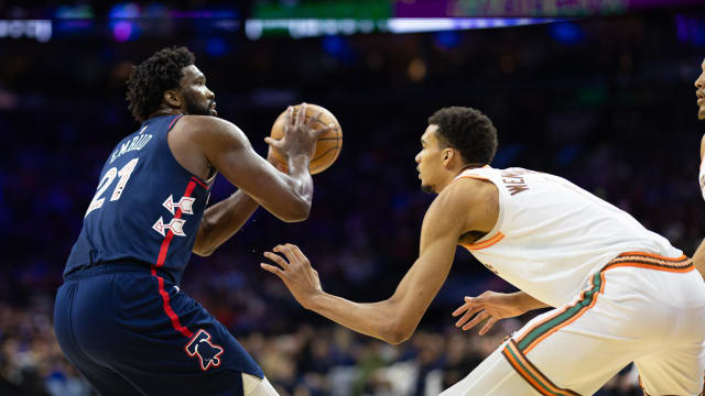 Jan 22, 2024; Philadelphia, Pennsylvania, USA; Philadelphia 76ers center Joel Embiid (21) shoots against San Antonio Spurs center Victor Wembanyama (1) during the second quarter at Wells Fargo Center.