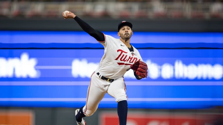 Tigers throw it away, wild toss in 9th gives Twins wild win