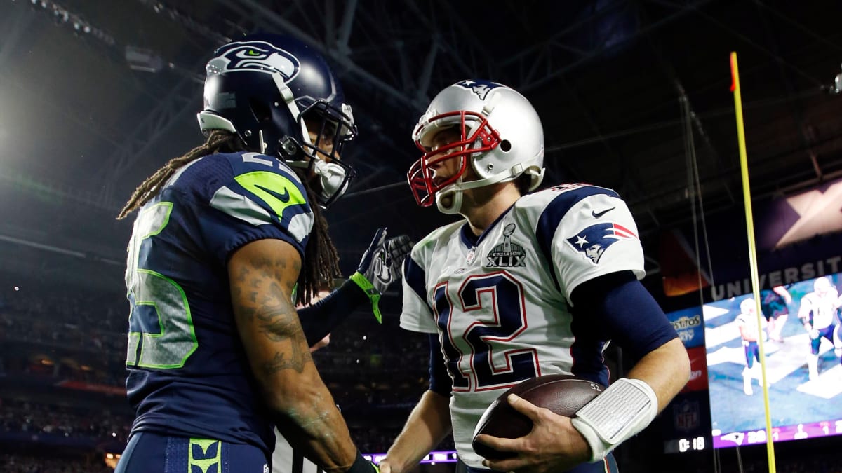 New England Patriots quarterback Tom Brady greets Seattle Seahawks