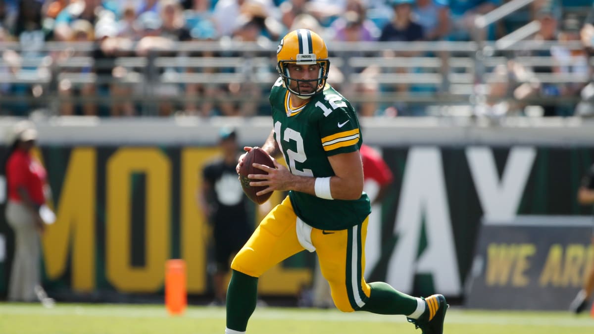 Aaron Rodgers might wear Purple in 2016 – PRO FOOTBALL RUMORS