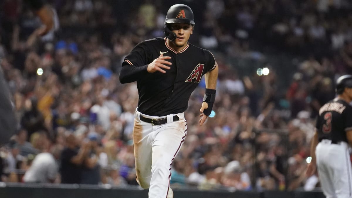 Arizona Diamondbacks and Team Mexico outfielder Alek Thomas stretches with  team Friday