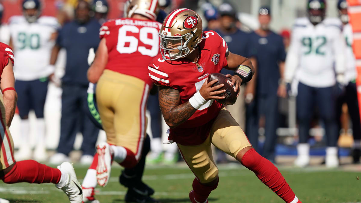 San Francisco 49ers quarterback Trey Lance warms up in a Crucial Catch shirt  before an NFL football game between the 49ers and the Seattle Seahawks in  Santa Clara, Calif., Sunday, Oct. 3