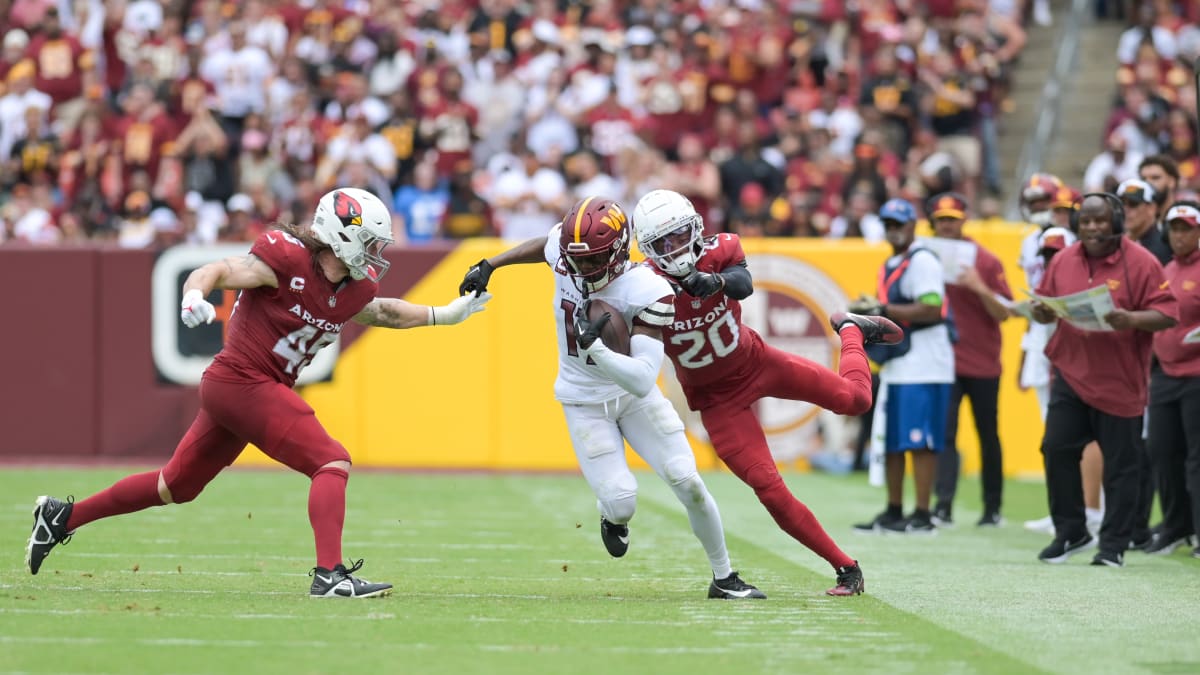 LANDOVER, MD - SEPTEMBER 25: Washington Commanders wide receiver Terry  McLaurin (17) kneels during the game between the Philadelphia Eagles and  the Washington Commanders on September 25, 2022 at Fedex Field in