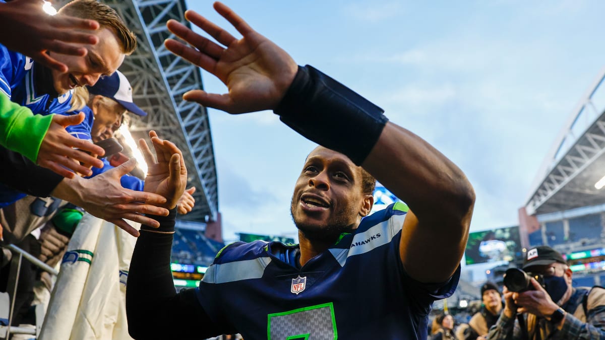 Who is the guy holding the SB Trophy? : r/Seahawks